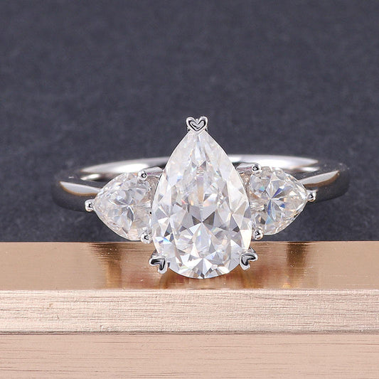 2.1 Carat Pear Moissanite with Heart and Round Stone Wedding Ring