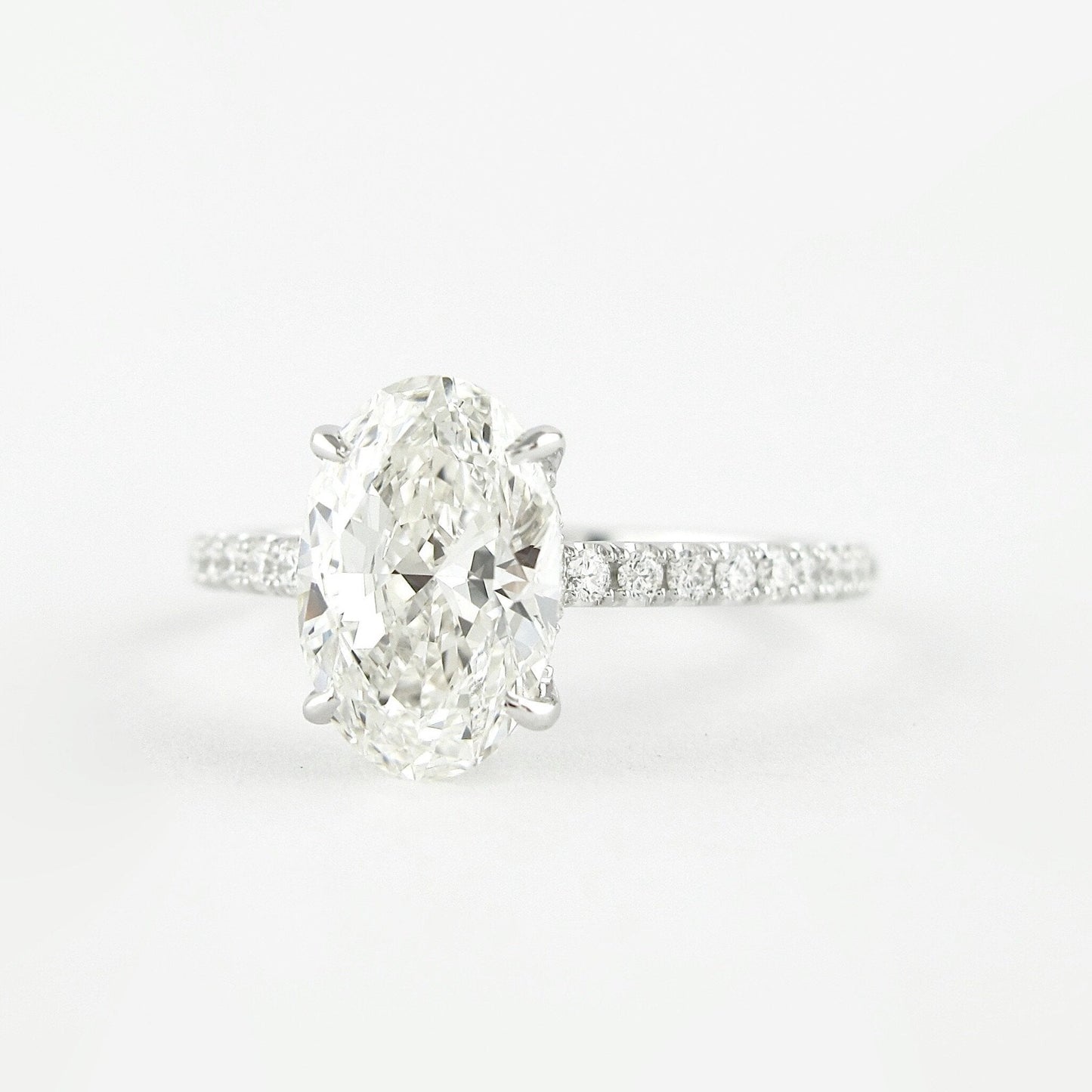 2.3 Carat Oval Moissanite with Round Cut Accent Engagement Ring
