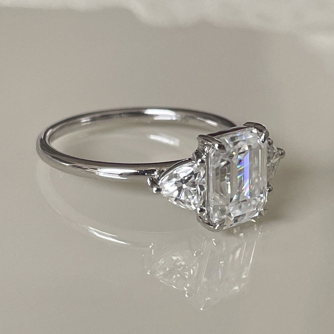 2.0 Ct Emerald Moissanite With Trapezoid Diamond Engagement Ring