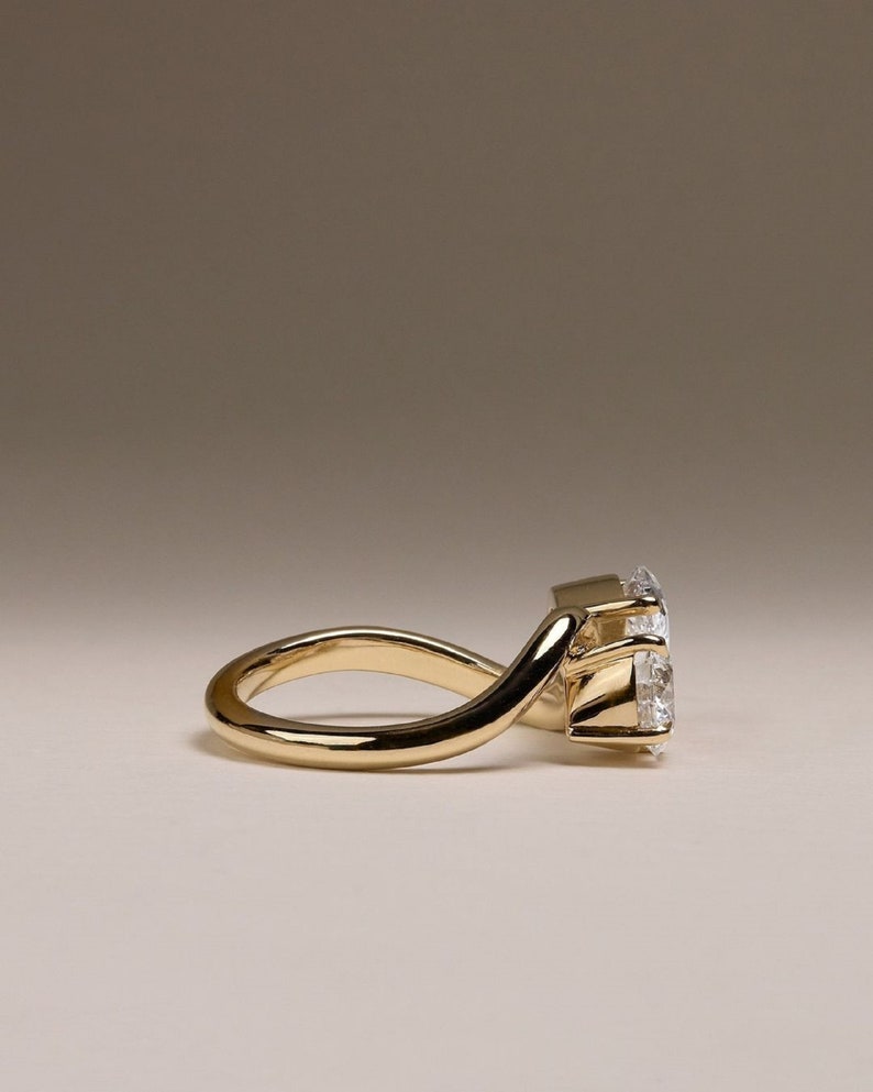 1.0 Ct Pear With 0.50 Ct Moissanite Engagement Ring