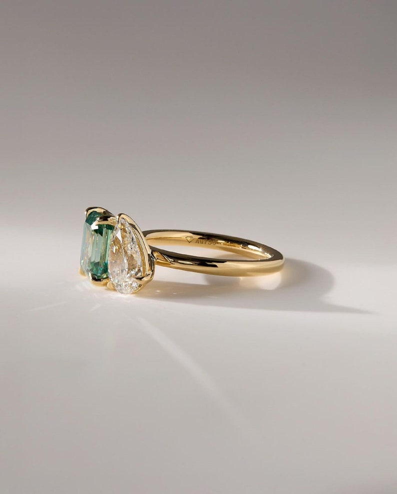 1.0 Ct Green Emerald With 1.0 Ct Pear Moissanite Engagement Ring