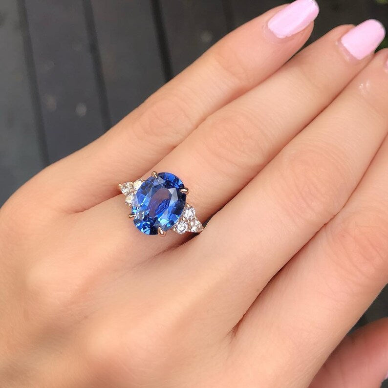 3.02 Carat Blue Oval Moissanite Engagement Ring with Round Details