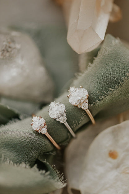 2.14 Carat Oval-Cut Moissanite Wedding Ring with Round-Shaped Accents