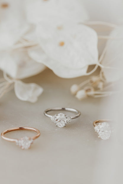 2.14 Carat Oval-Cut Moissanite Wedding Ring with Round-Shaped Accents