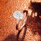 2.2 Ct Elongate Cushion Moissanite With Round Cut Engagement Ring