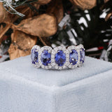 Blue Sapphire Oval With Brilliant Round Moissanite Ring