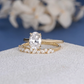 1.1 Ct Oval Moissanite With Marquise & Round Bridal Set