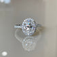 2.1 Ct Oval Moissanite With Round Cut Engagement Ring