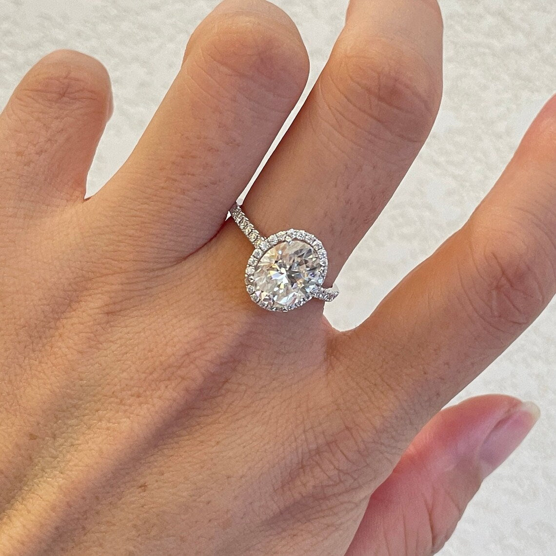 2.1 Ct Oval Moissanite With Round Cut Engagement Ring