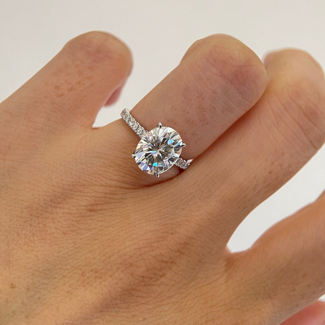 2.06 CT Oval Moissanite & Round Engagement Ring