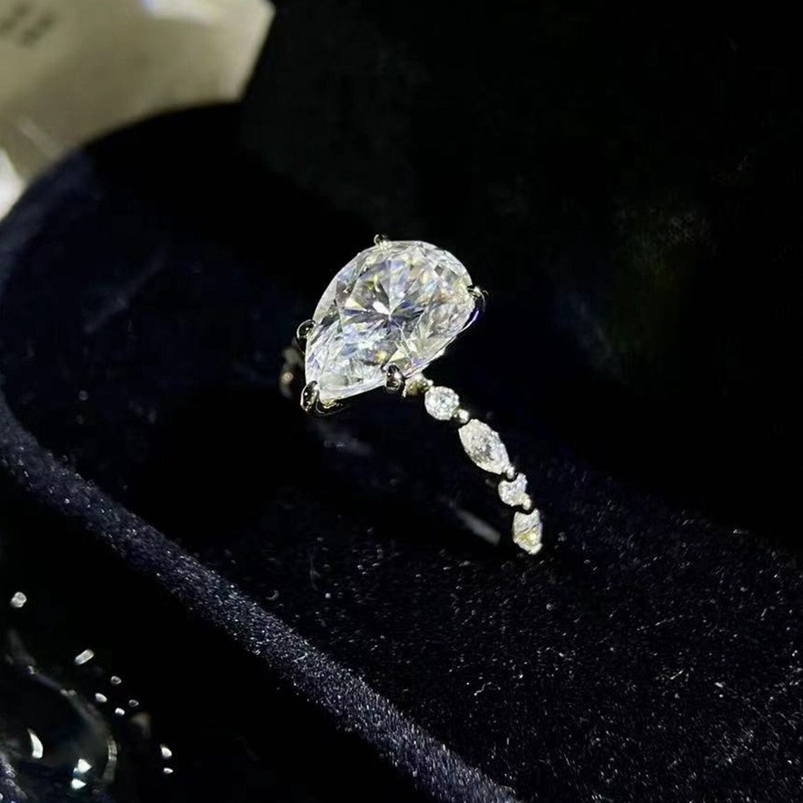 2.0 Ct Pear Moissanite With Marquise And Round Cut Engagement Ring