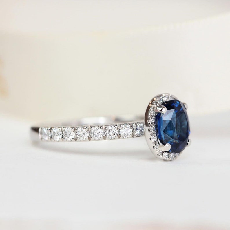 2.0 Ct Blue Oval With Brilliant Round Moissanite Engagement Ring