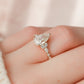 2.01 Ct Pear Moissanite With Marquise & Round Engagement Ring