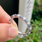 1.40 Ct Brilliant Round Moissanite With Blue Sapphires Eternity Band