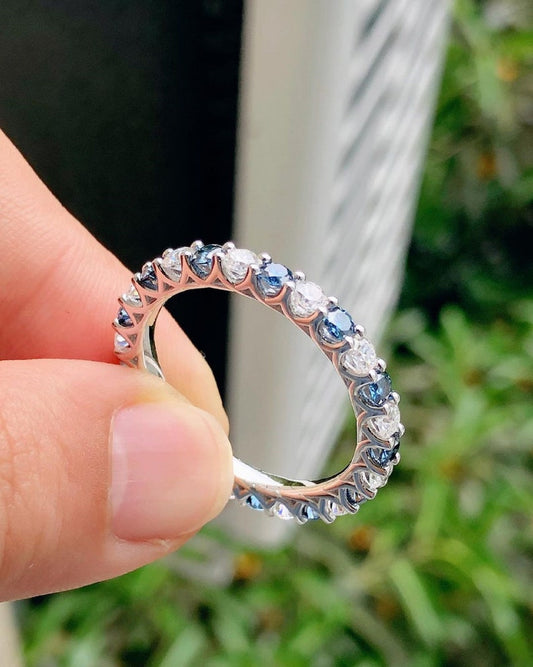 1.40 Ct Brilliant Round Moissanite With Blue Sapphires Eternity Band