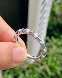 1.40 Ct Brilliant Round Moissanite With Blue Sapphires Eternity Band