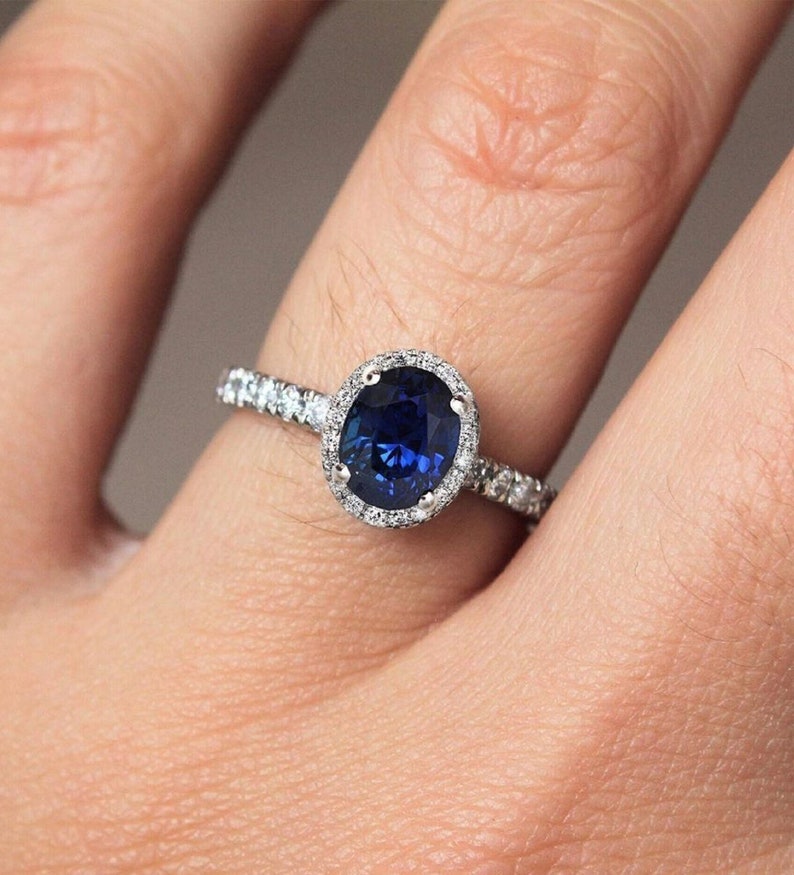 2.0 Ct Blue Oval With Brilliant Round Moissanite Engagement Ring