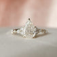 2.01 Ct Pear Moissanite With Marquise & Round Engagement Ring