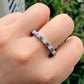 1.40 Ct Brilliant Round Moissanite With Blue Sapphires Eternity Band