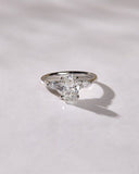 2.05 Ct Oval Moissanite With 2 Pear Moissanite Engagement Ring