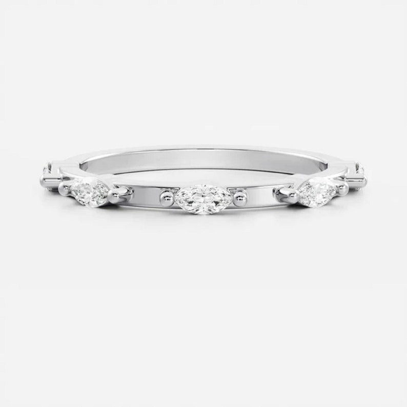 Marvelous Marquise Moissanite Promise Band