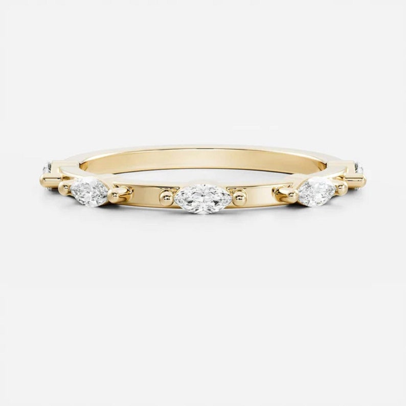 Marvelous Marquise Moissanite Promise Band