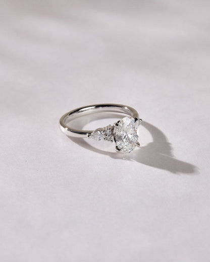 2.05 Ct Oval Moissanite With 2 Pear Moissanite Engagement Ring