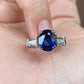 2.0 Ct Blue Oval With Tappers In Side Engagement Ring