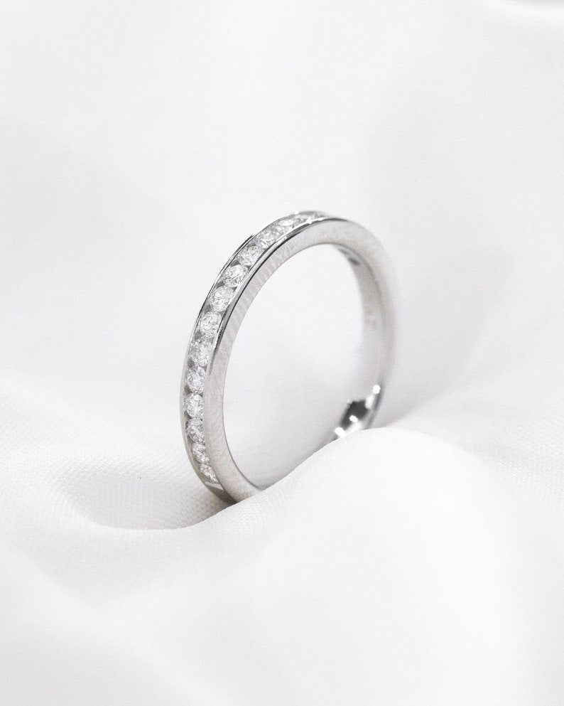 Ravishing Brilliant Round Moissanite Promise Band