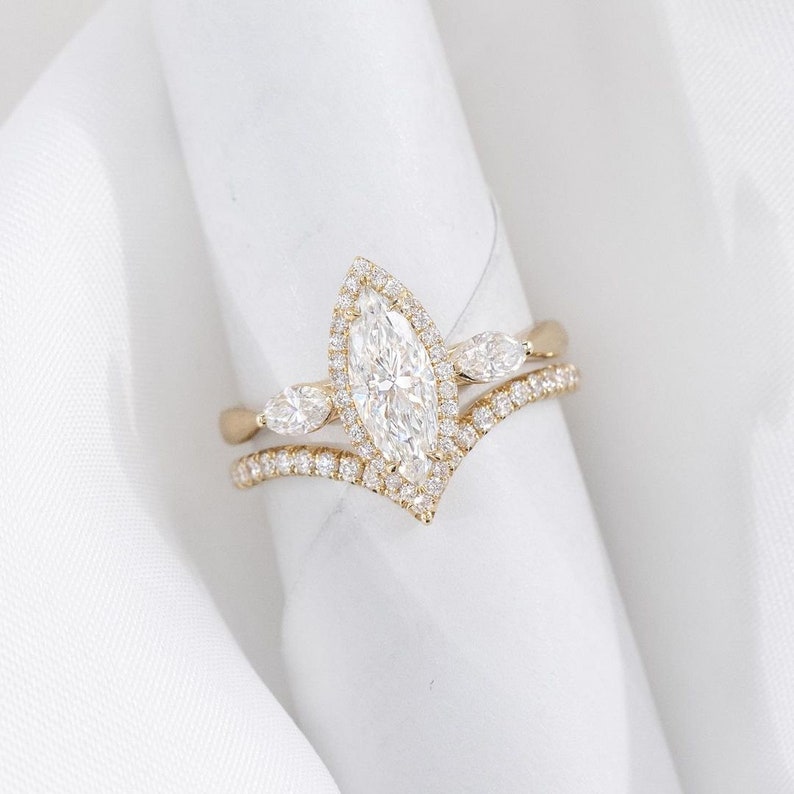 3.0 Ct Marquise Moissanite With Pears & Round Engagement Ring