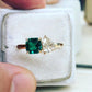 1.0 Ct Pear Moissanite With Green Asscher Two Headed Ring