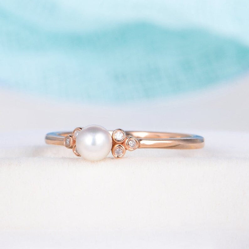 Beautiful Pearl In The Center With 6 Round Moissanite Ring