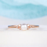 Beautiful Pearl In The Center With 6 Round Moissanite Ring