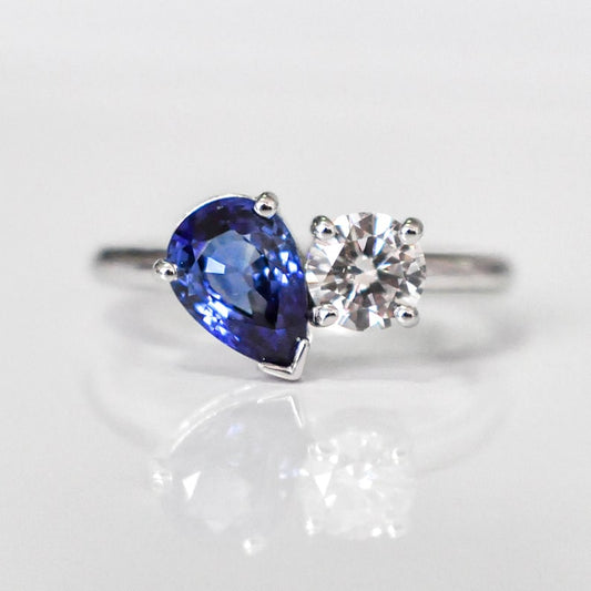 2.0 Ct Bashing Blue Pear With Round Moissanite Two Headed Ring