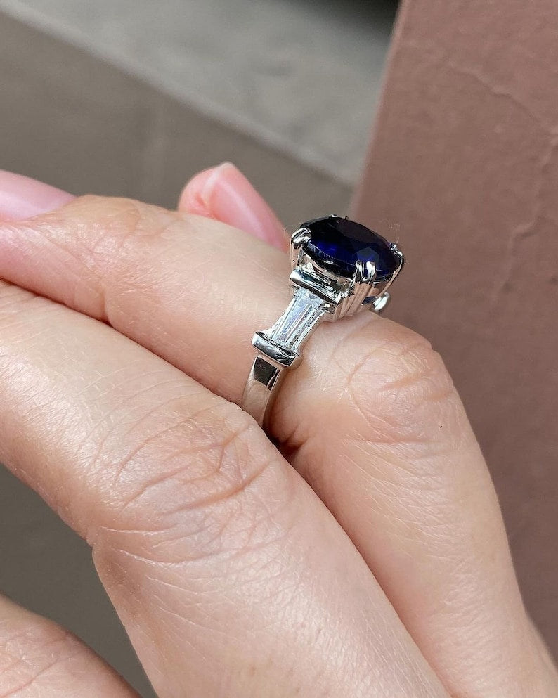 2.0 Ct Blue Oval With Tappers In Side Engagement Ring