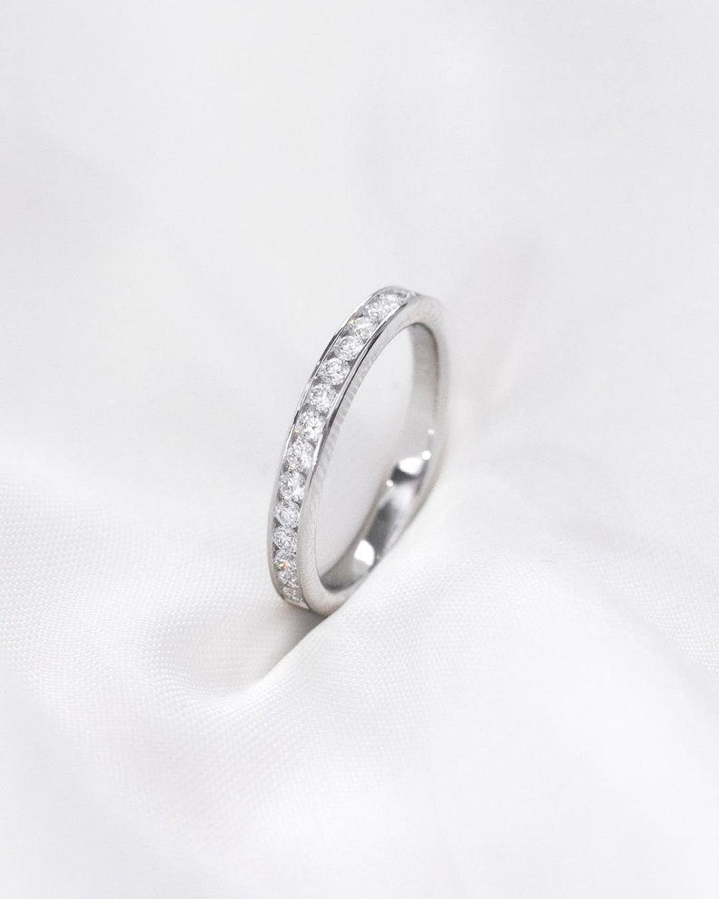 Ravishing Brilliant Round Moissanite Promise Band