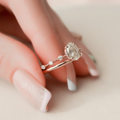 1.24 Carat Oval Moissanite Bridal Set with Round Cut Side Stones