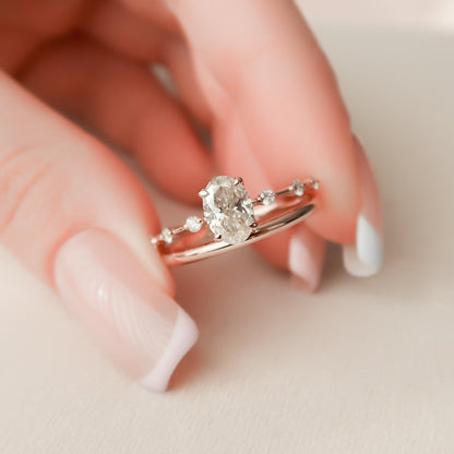 1.24 Carat Oval Moissanite Bridal Set with Round Cut Side Stones